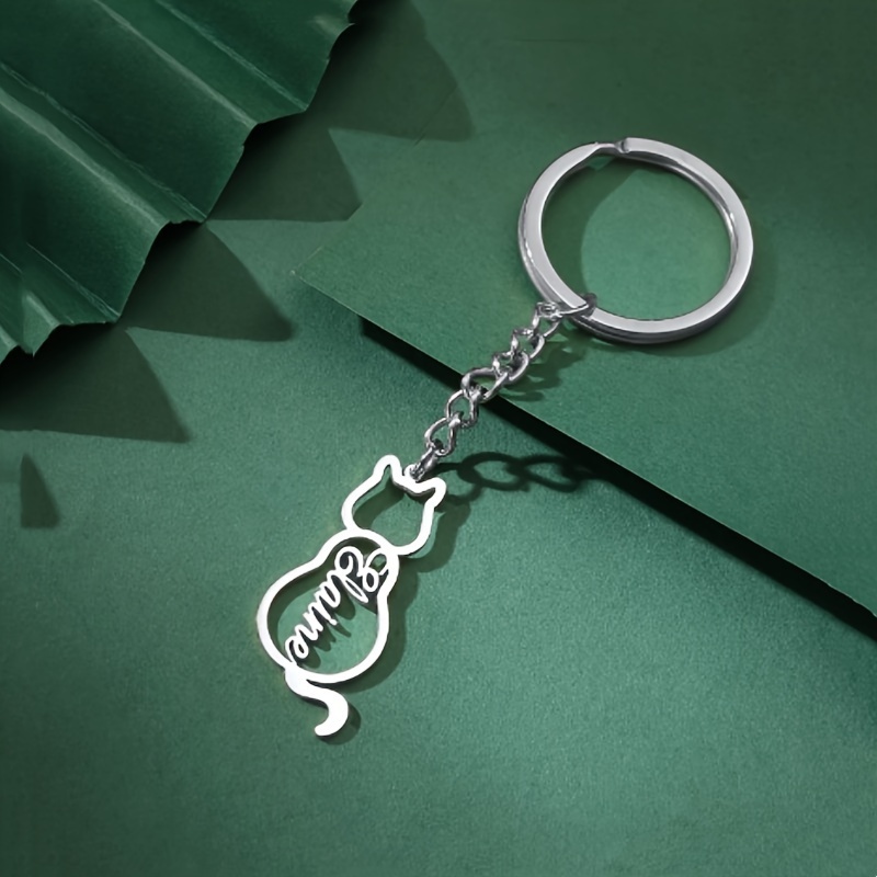 Image of A Custom-made Stainless Steel Keychain Featuring A Stylish And Elegant Hollow , Perfect For Women To Wear , Work, Or Leisure. It Makes A Great Gift For On Birthdays, Holidays
