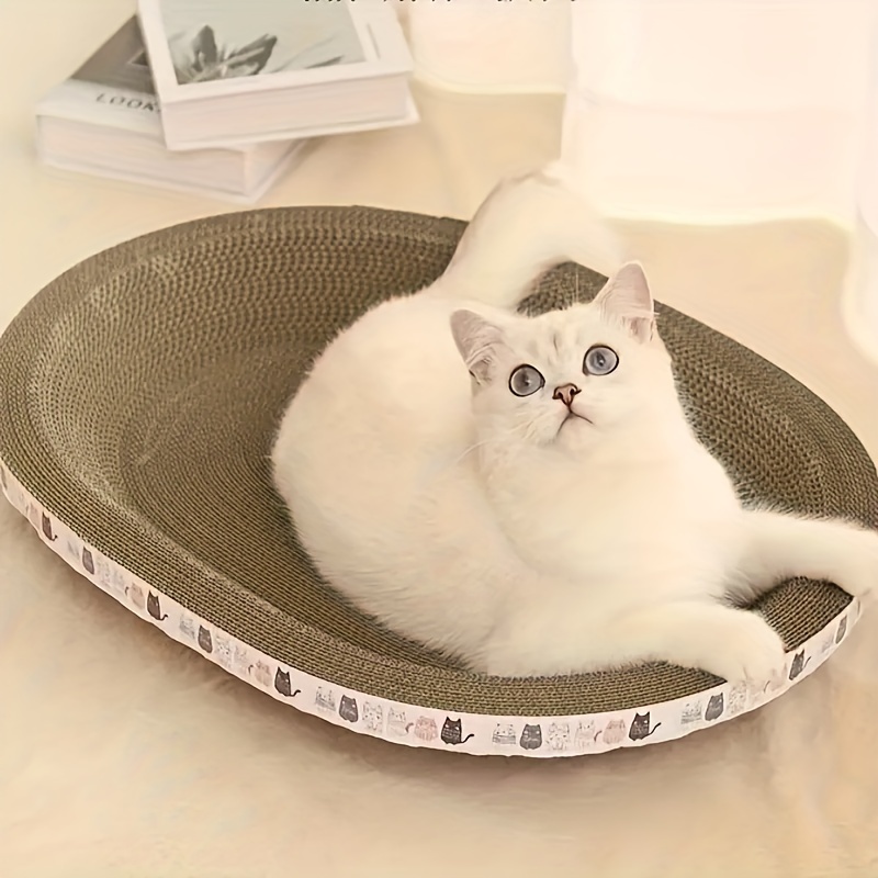 

1pc Oval Shaped Corrugated Paper Cat Scratch Board, Wear-resistant Cat Scratching Pad Integrated Cat Nest