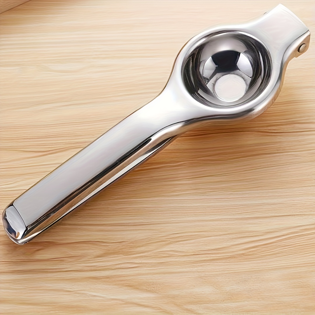 Ergonomically Designed Manual Juicer Ideal For Extracting Juice From Lemons, , And - Perfect For Kitchen And Restaurant Settings. This Features A Sleek And Durable Construction
