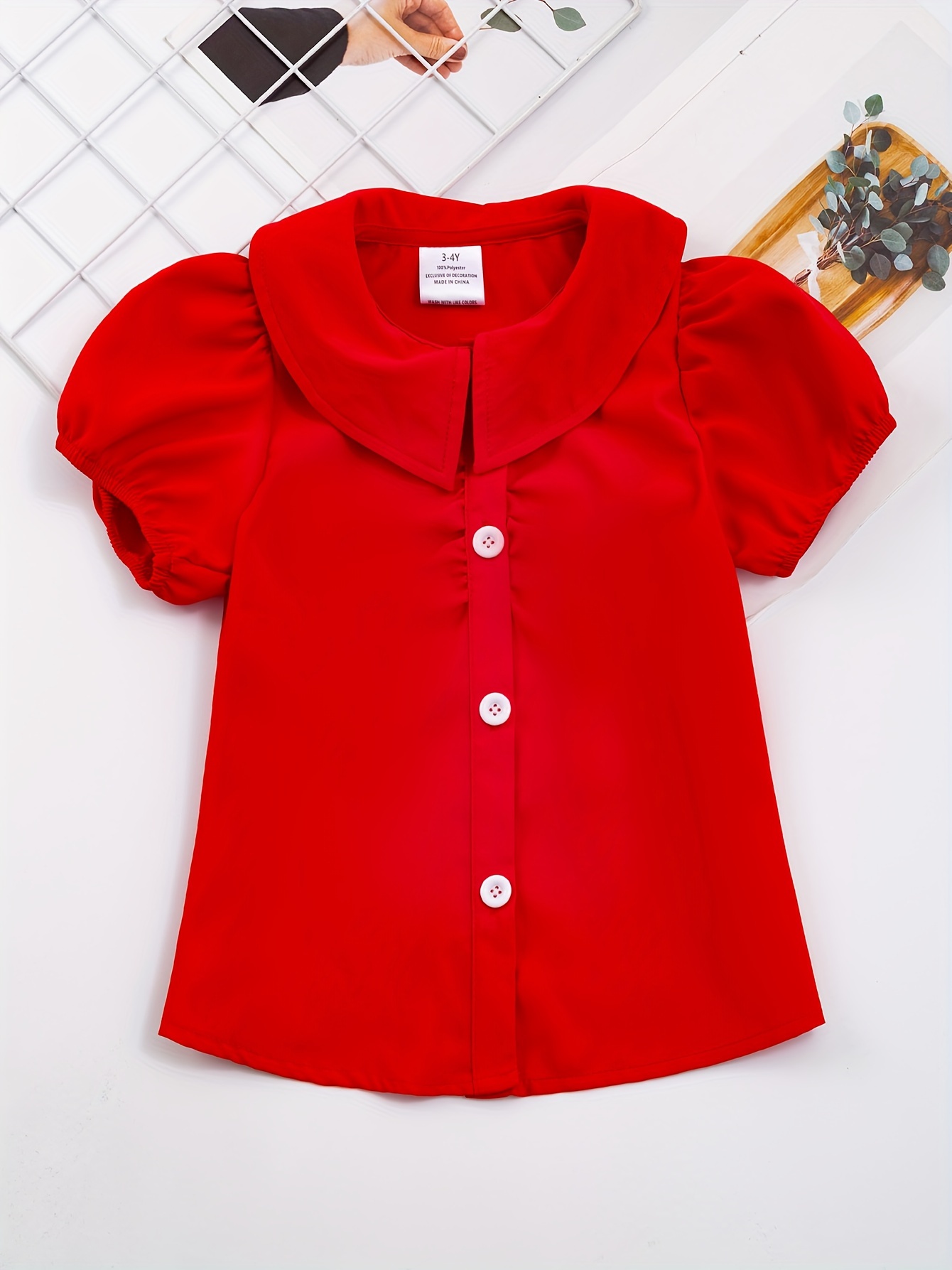 Camiseta con cuello enrollado liso roja niña