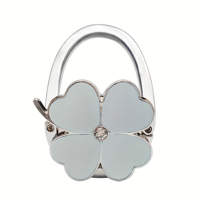 E-shop Kreativer Vierblättriger Kleeblatt-Haken, Tragbarer Metall-Handtaschenhaken für Damen mit Kleeblatt-Design, Faltbarer Handtaschenhaken