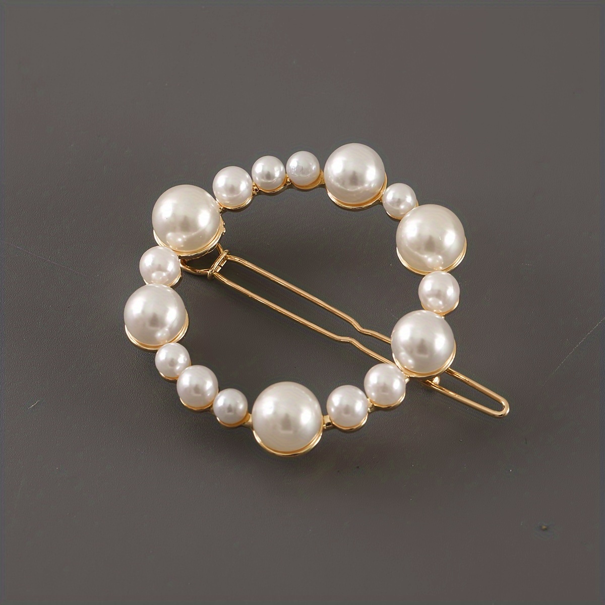 Image of A Single Irregular Hair Clip With Artificial Pearls In Golden Color For Hair Decoration
