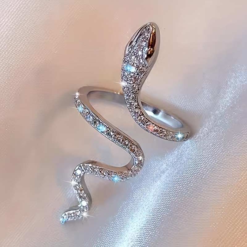 

Sparkling Fashion Statement With A Delicate Zirconia-encrusted Coiled Snake Ring