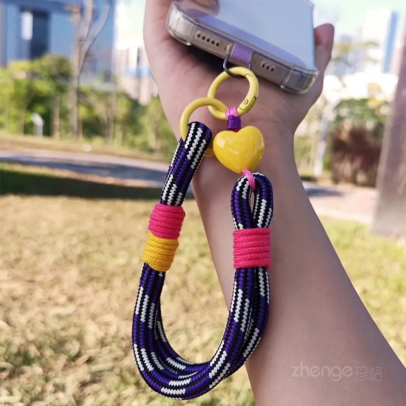 Foto de Strap/correa de mano adaptable a cualquier celular.