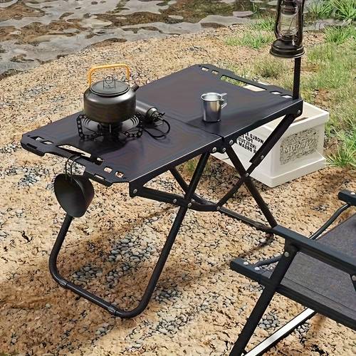 compact and collapsible camping table made from durable carbon steel requires no setup lightweight yet for activities like hunting fishing outdoor survival barbecues and picnics color black camping gear