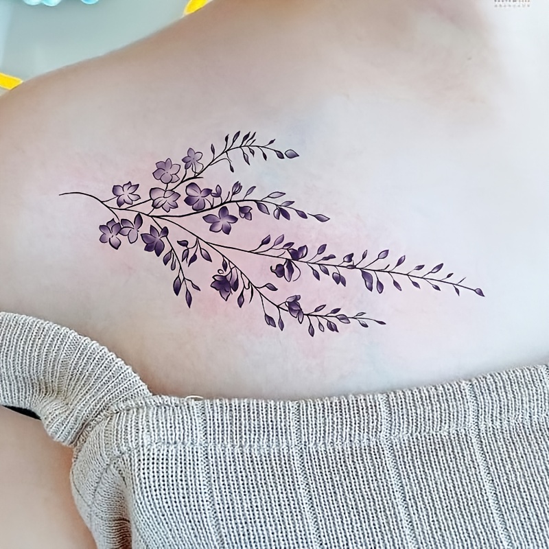 a tattoo sticker featuring delicate purple wisteria branches - Temu Bahrain