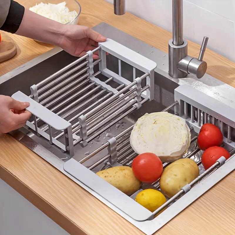 adjustable stainless steel sink organizer with drain basket foldable multi layer kitchen storage rack for utensils cups and vegetables washing and drying rack for dishes utensil holder sleek durable construction kitchen sink accessories Product details 0