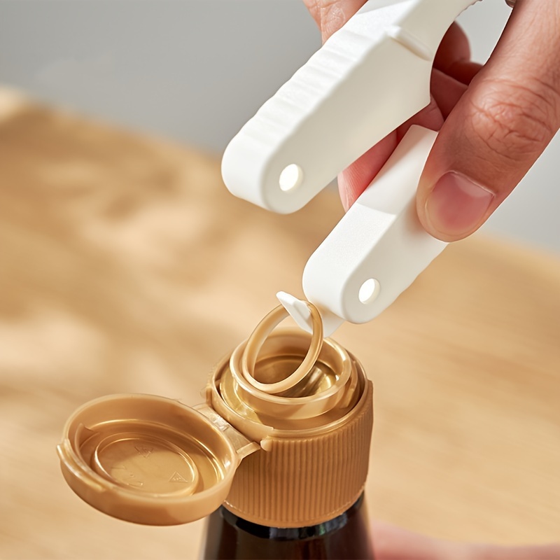 

1pc, Plastic Bottle & Can Opener, No Batteries Required, Easy Grip Twist Cap, Ideal For Soda And Beverage Bottles, Magnetic Design For Japanese-style Opening