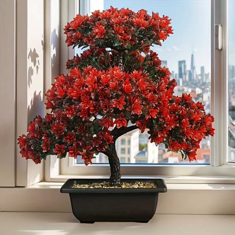 video's neppe dennenboom met plastic pot