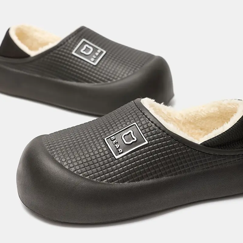 womens winter 2025 new arrival elegant slip on slippers with thick plush fleece lining warm cushioned insole black hand clean shoes cozy indoor footwear textured strap detail durable footwear construction Product details 2