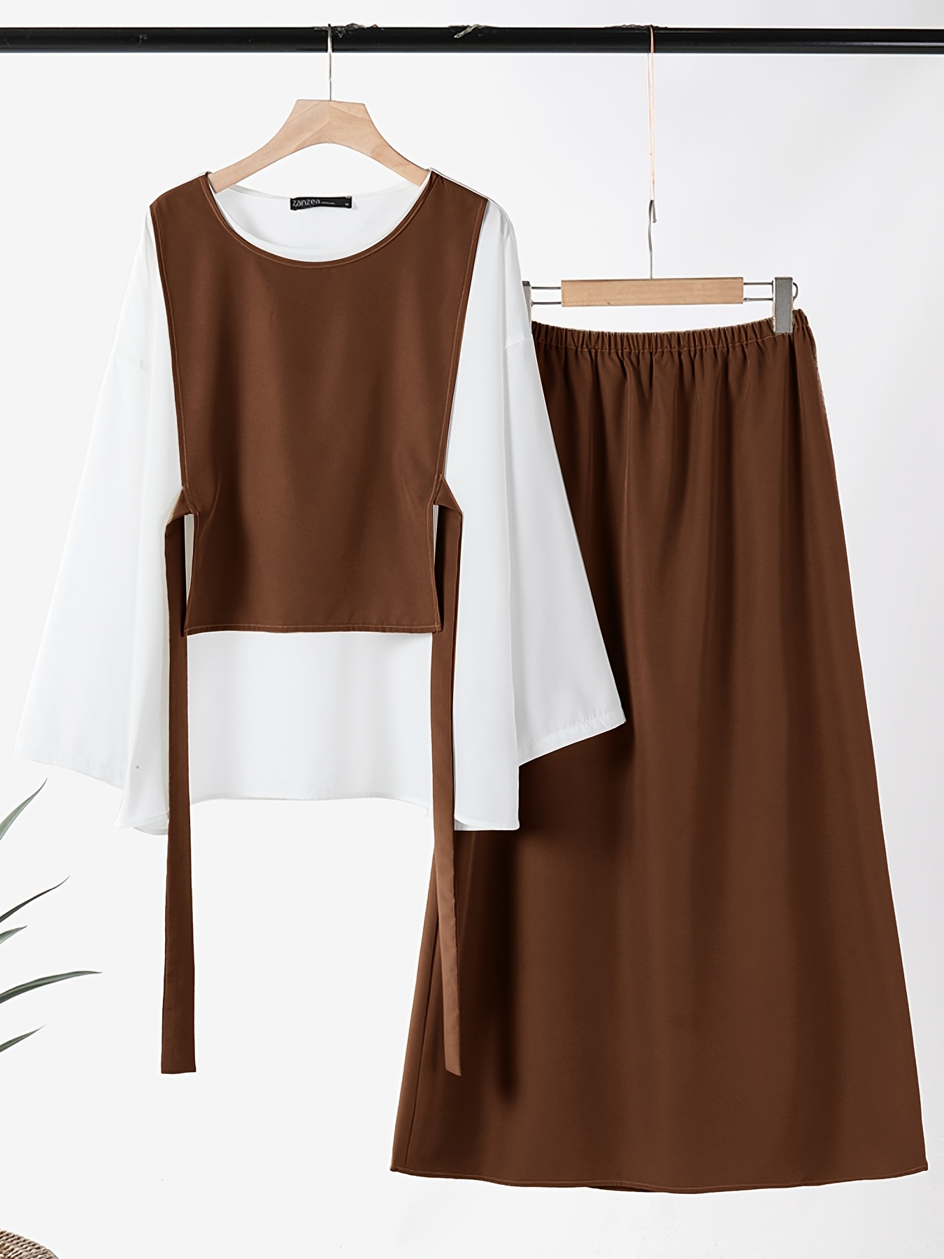 Effortless Chic Workwear Set Sophisticated and stylish workwear set perfect for the modern woman Features a tailored blazer and comfortable pants