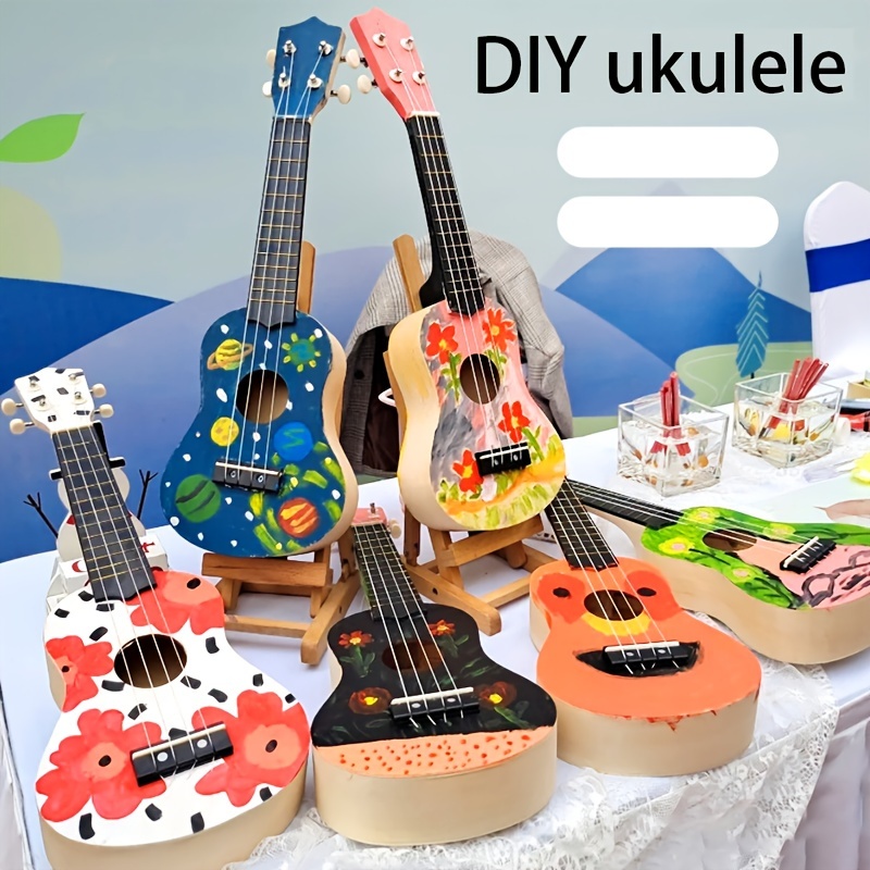 

1pc Wooden Diy Ukulele Kit - 21" Handcrafted Mini Guitar With Graffiti Design, Decor Craft, Ideal For Birthday, Christmas, Valentine's Day Gifts, No Electricity Required, Featherless, Includes Box