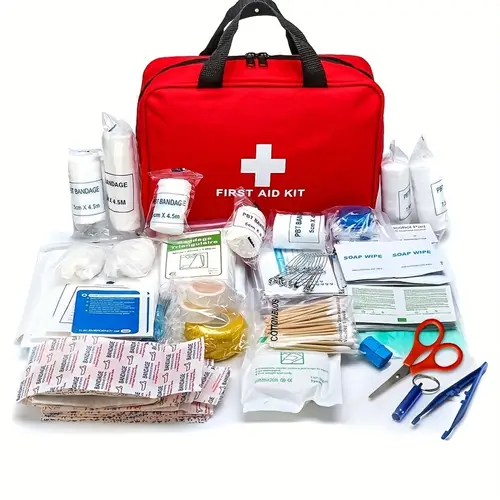 portable first aid kit including professional scissors and tweezers specifically designed for camping hiking hunting and all types of outdoor activities with essential first aid supplies