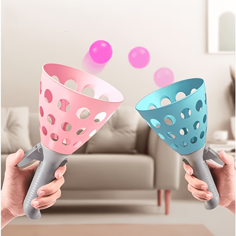 item picture Get the Party Started with This Exciting Toss and Catch Set! Includes Launchers and Soft Balls for Lively Group Play. Perfect for Parties, It Boosts Coordination and Adds Active Fun to Any Celebration. Durable and Safe for Joyful Indoor or Outdoor