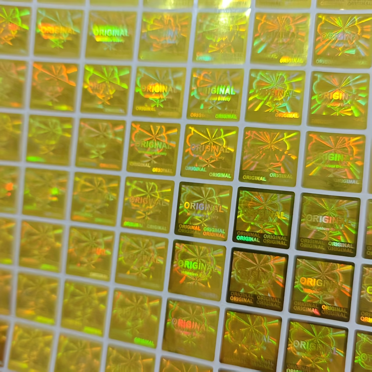 Image of 200pcs Holographic Anti-counterfeiting Labels, Self-adhesive Pet Laser Stickers, Glossy Golden Sealing Stickers, Security Labels 0.59x0.59in, Iridescent Plastic Labels For Secure Packaging & Branding
