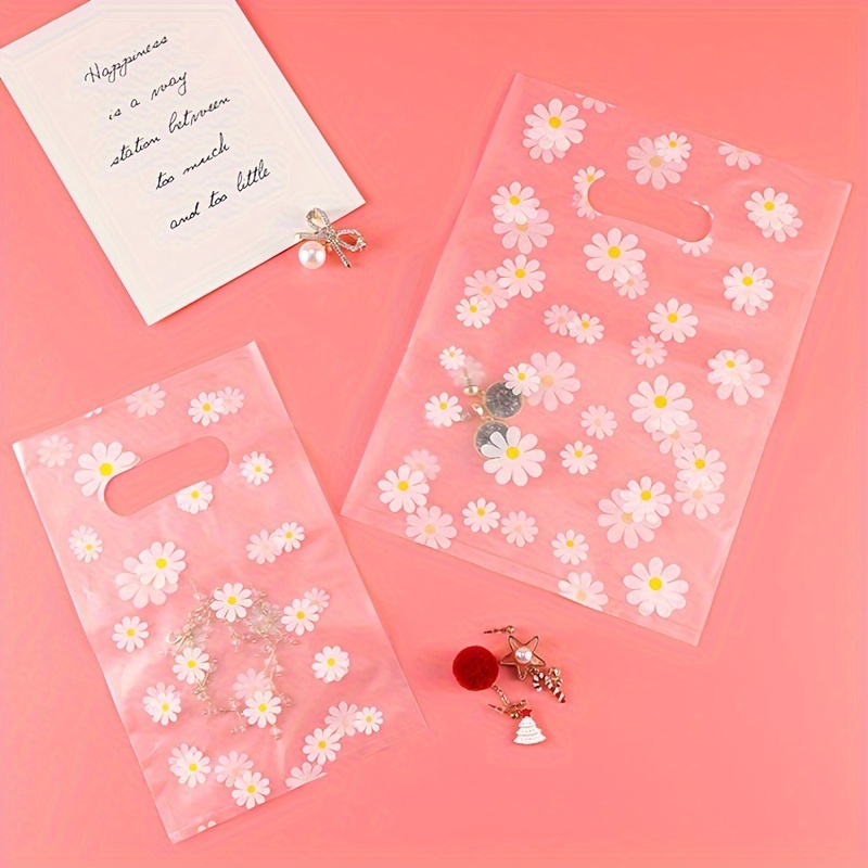 

100pcs Transparent Packaging Bag For Store, Plastic Gift Bag, Suitable For Shopping Mall Door Shop, Daisy Tote Bag, Can Be Used For Decorations, Clothes, Food