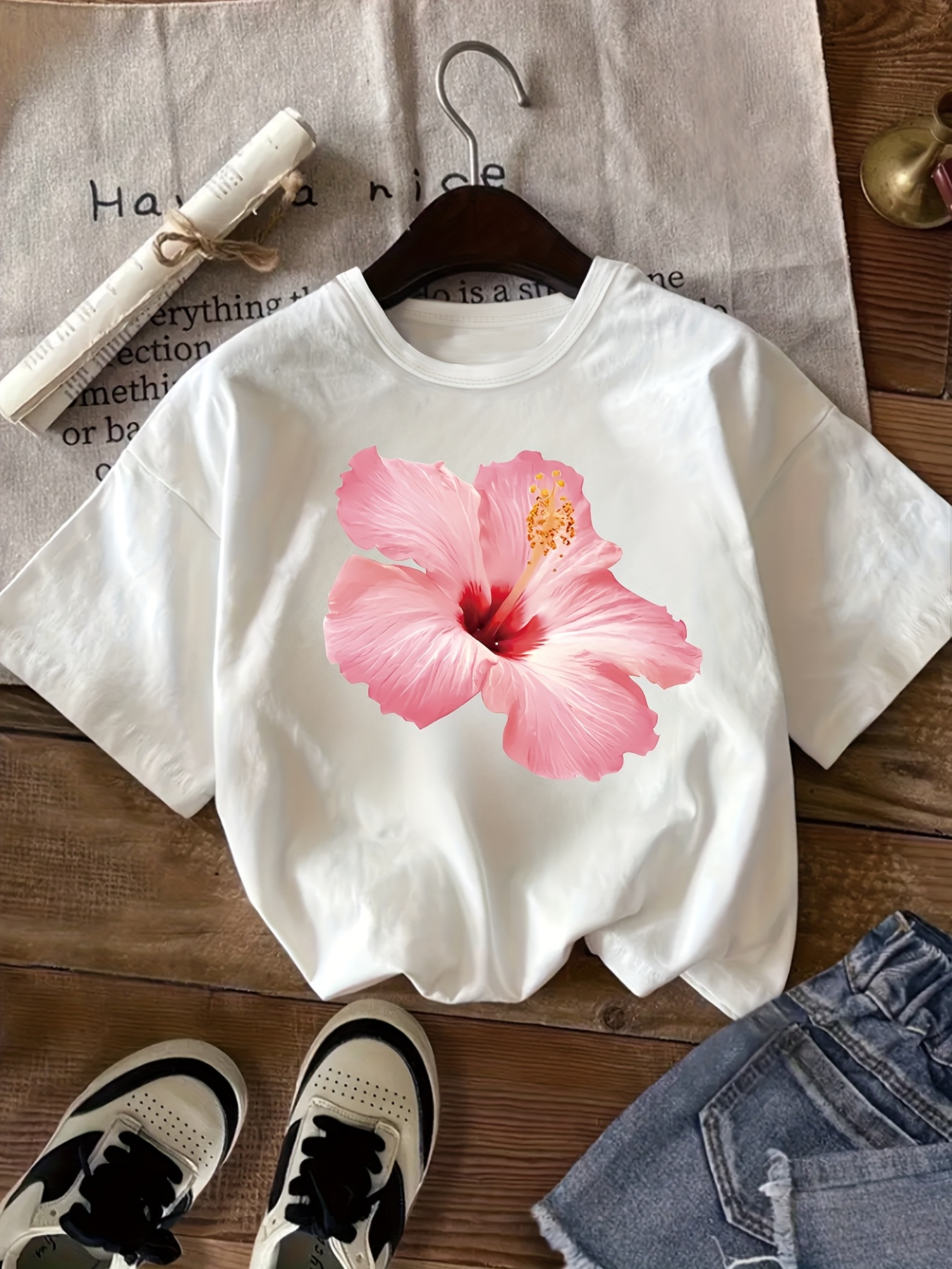 flower tee shirt sold on Temu United States