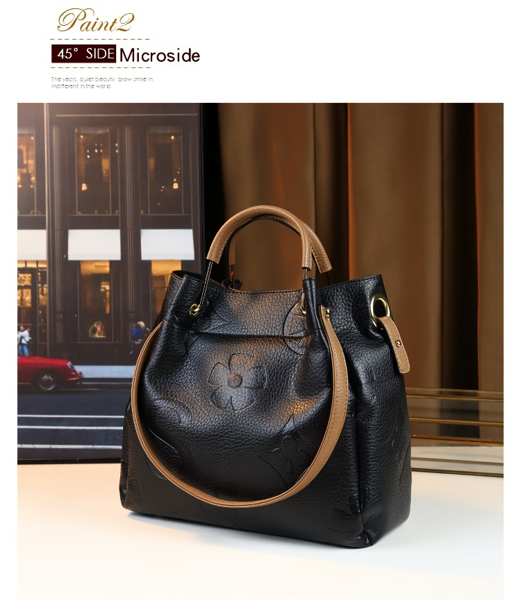 Black handbag front view with argyle pattern