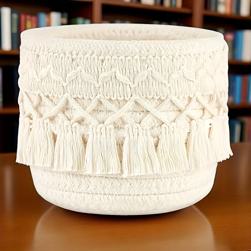 sendpistil vintage round woven desktop storage basket with fringe natural fabric makeup brush organizer for vanity bathroom desk decorative cosmetic accessories organizer shelf baskets Product details 10