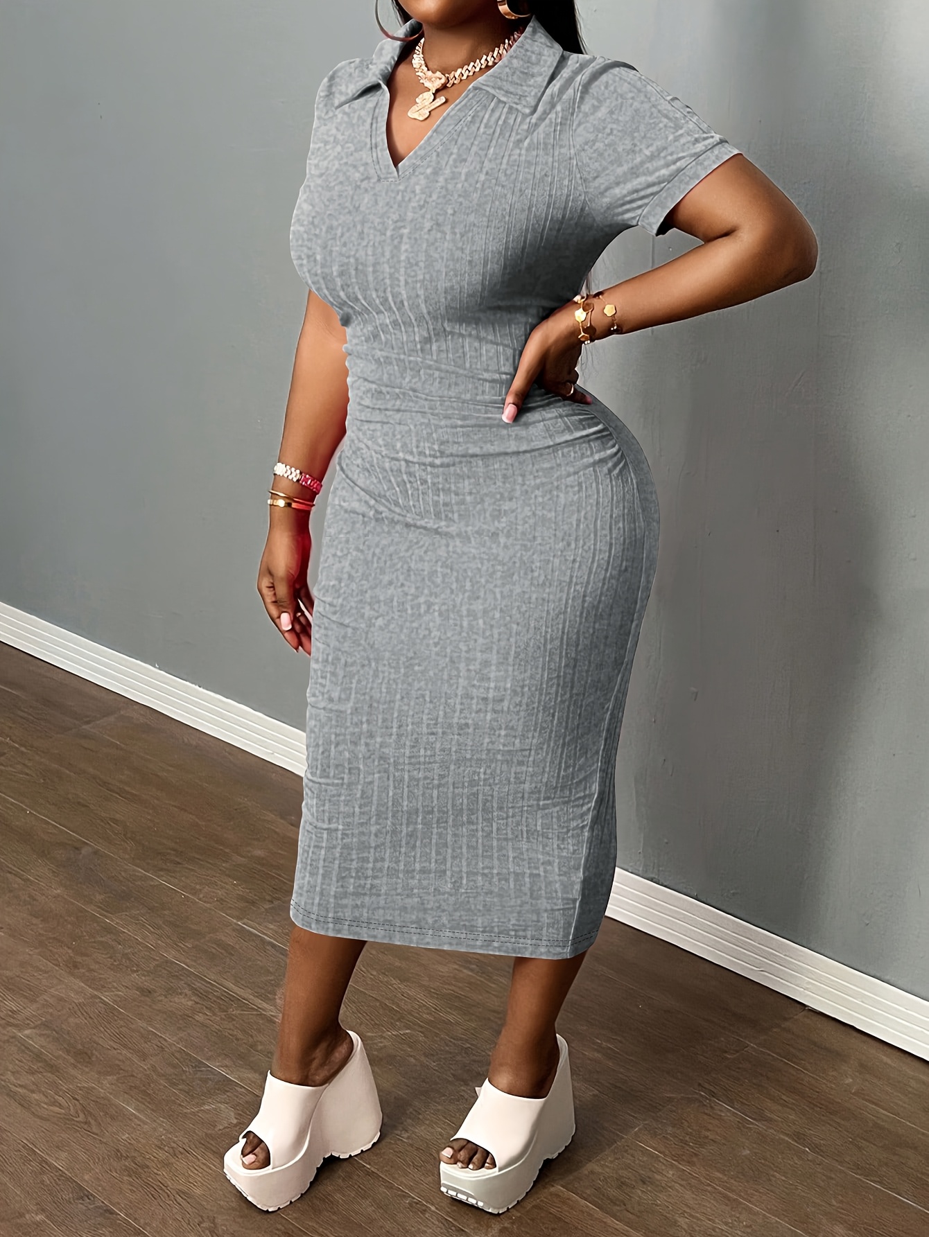 how to style midi bodycon dress Windsor Extra Confident Strappy Back Bodycon Midi Dress in Black | Size: S main image 1