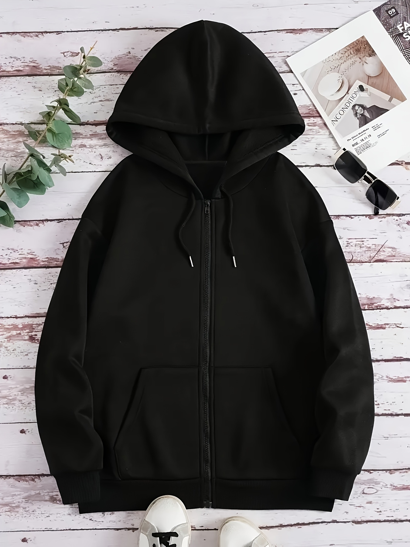 black zip hoodie sold on Temu United States