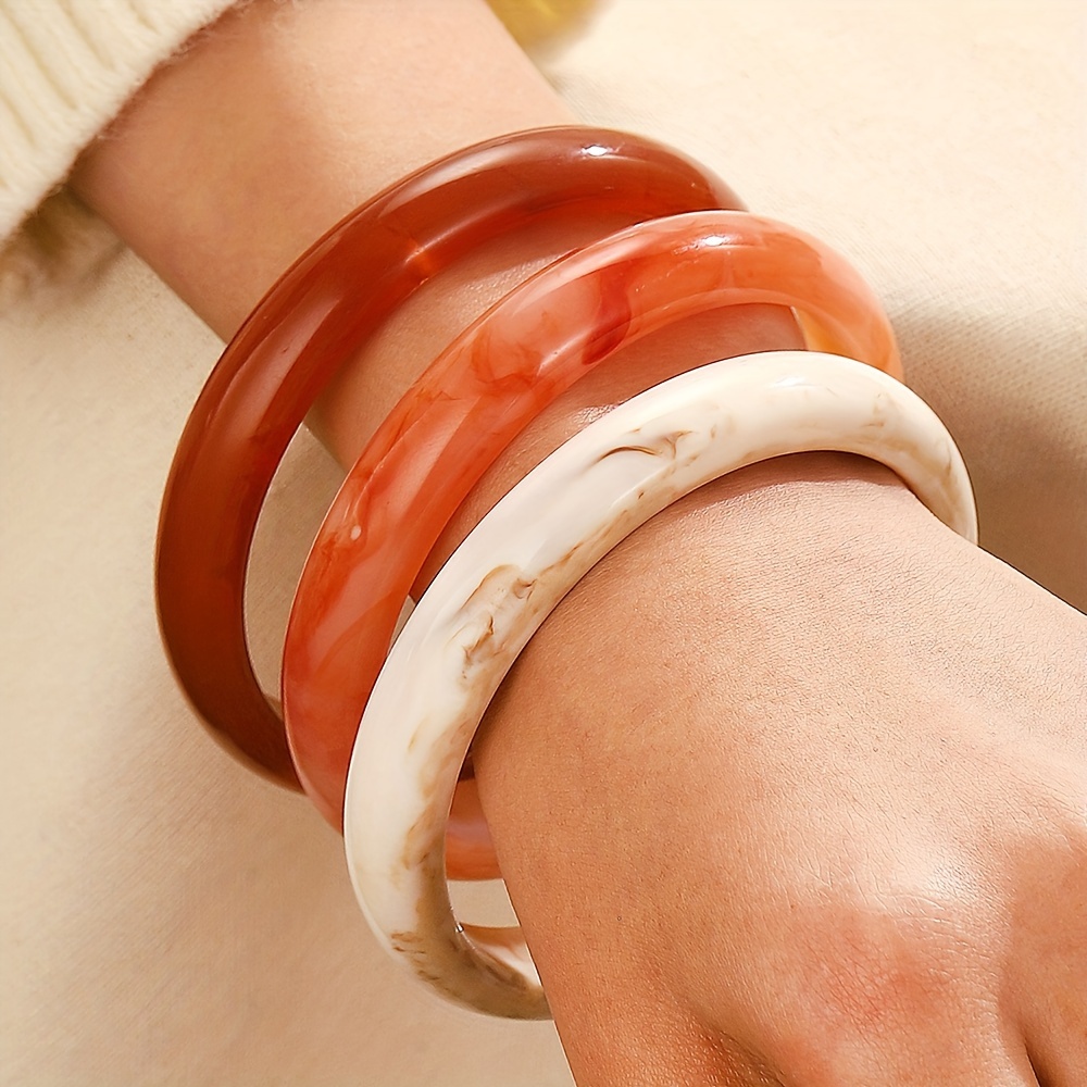 acrylic bangles sold on Temu United States