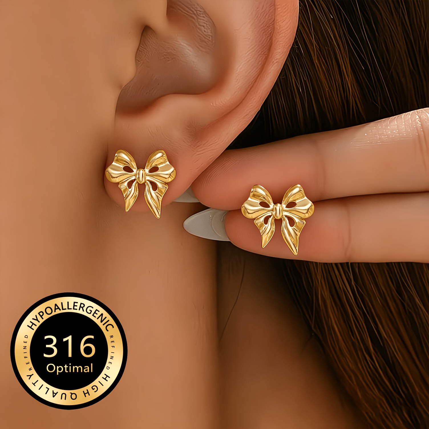 TEMU Une paire de clous d'oreilles dorés en acier inoxydable de nœud, hypoallergéniques et ne se décolorant pas, avec de magnifiques de nœud ajourés.