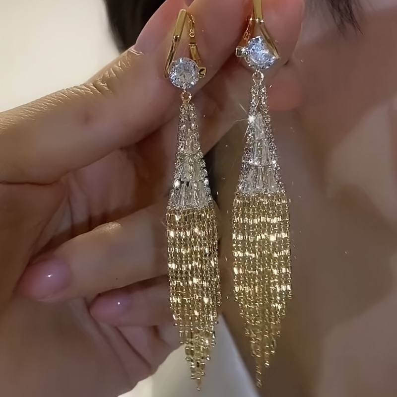 

Long, Luxurious Women's Earrings Sparkling With Cubic Zirconia And A Tassel Design