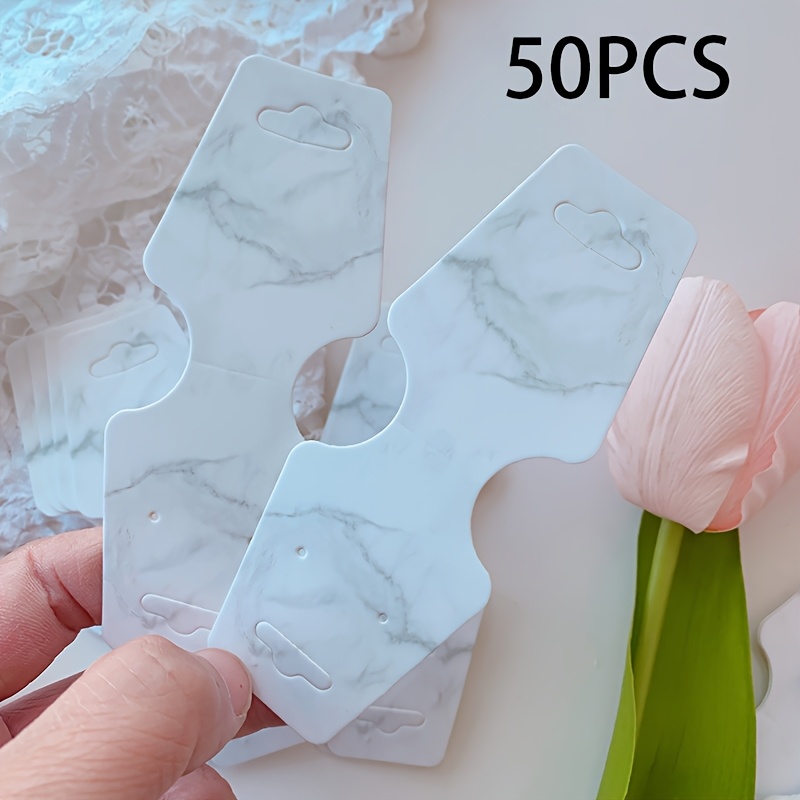 Image of 50 Sheets Of Marble-patterned Double-sided Adhesive Jewelry Cardstock For Packaging Necklaces, Earrings, Bracelets, Hair Ties, And Storage
