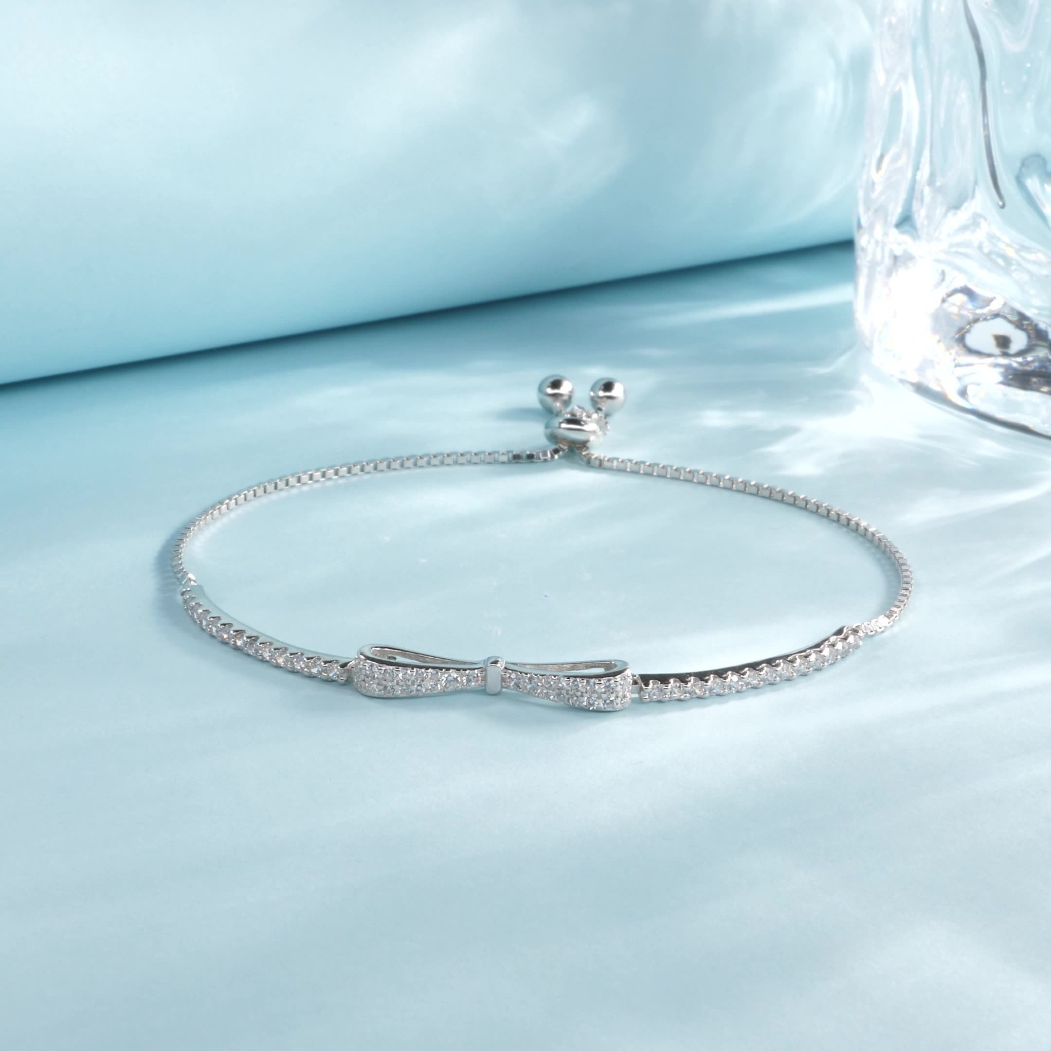 Sterling Silver Bow Bracelet CZ December Birthstone
