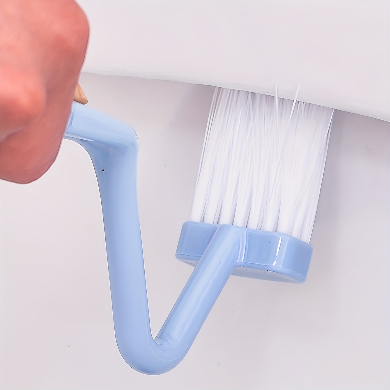 Blue V-Shaped Toilet Brush: Innovative S-Shaped Curved Design for Efficient Cleaning of The Toilet Bowl.
