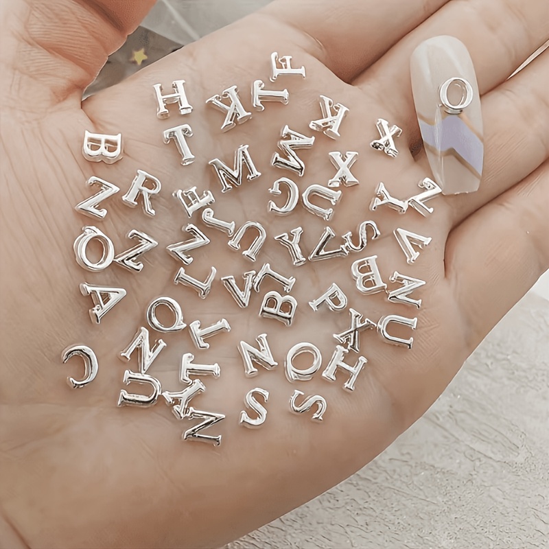 TEMU 104-teiliges Set mit minimalistischen 26 englischen Buchstaben (je 4 Stück), 3D-Nagelkunst-Anhänger Strasssteine aus gemischter Metalllegierung