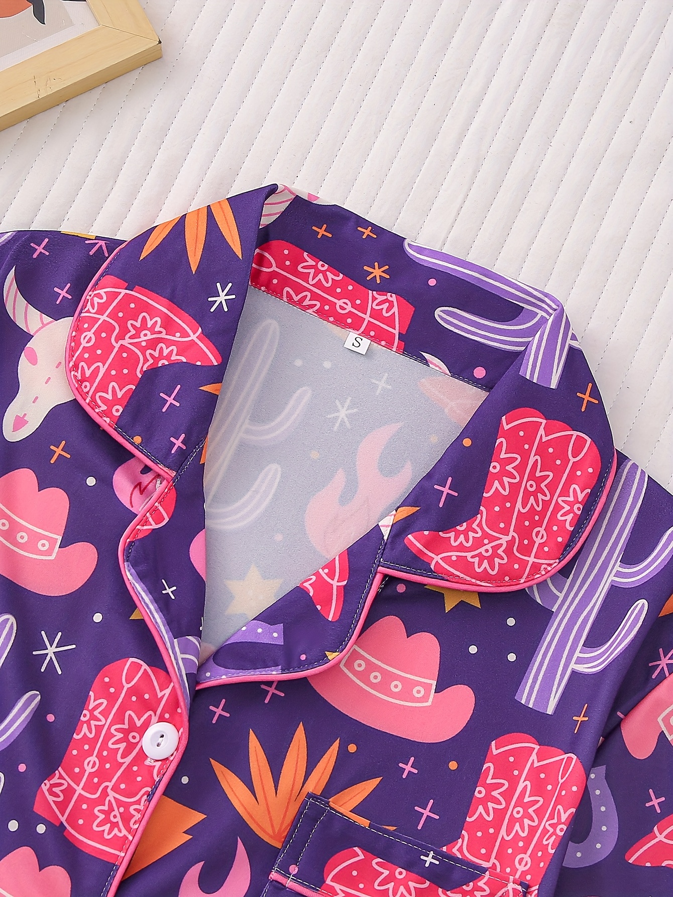 two sets of womens sleepwear sets   of womens sleepwear sets fabric short sleeved button up top and matching shorts full body print collar and pocket details suitable for womens adult sleepwear sets Product details 4