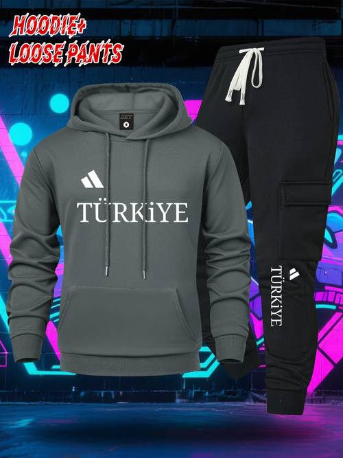 neues, trendiges kapuzenpullover und eine lockere cargo-hose mit mehreren , für lässige alltagskleidung. dieses atmungsaktive kapuzen-set mit kordelzug und die lockeren, langen hose verfügt über einen -druck und eine känguru-vordertasche.