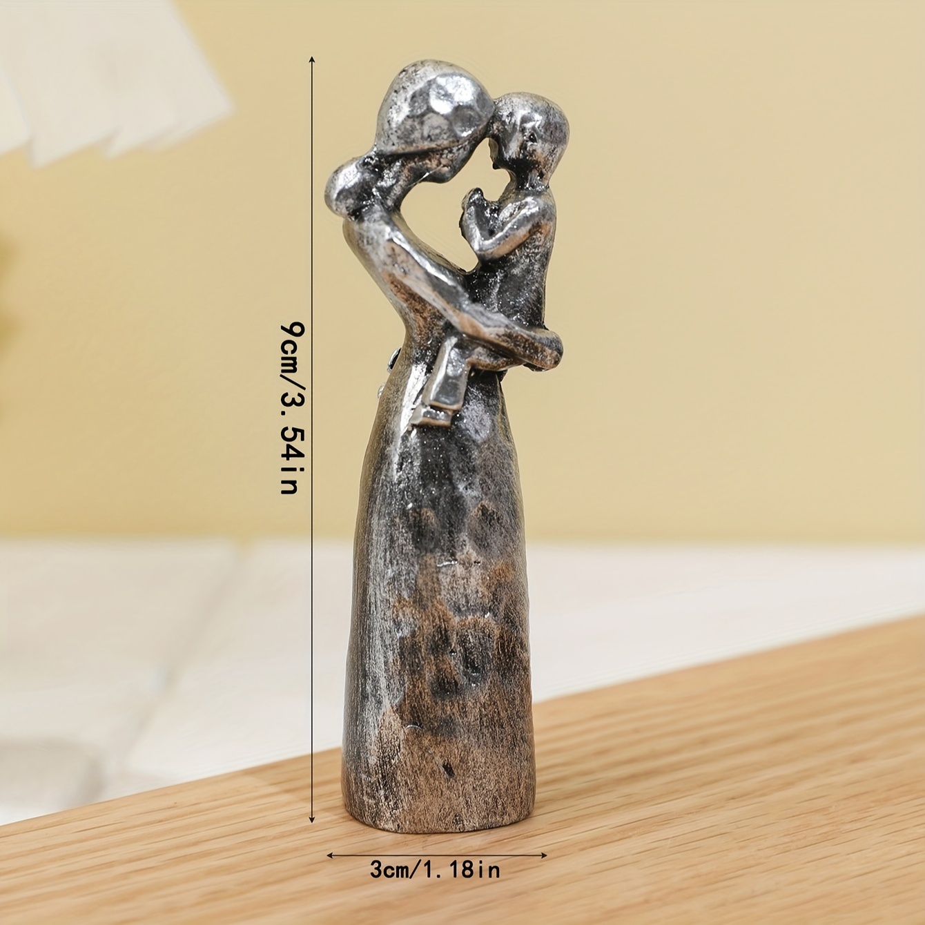 a decorative figurine of a mother and Product details 2