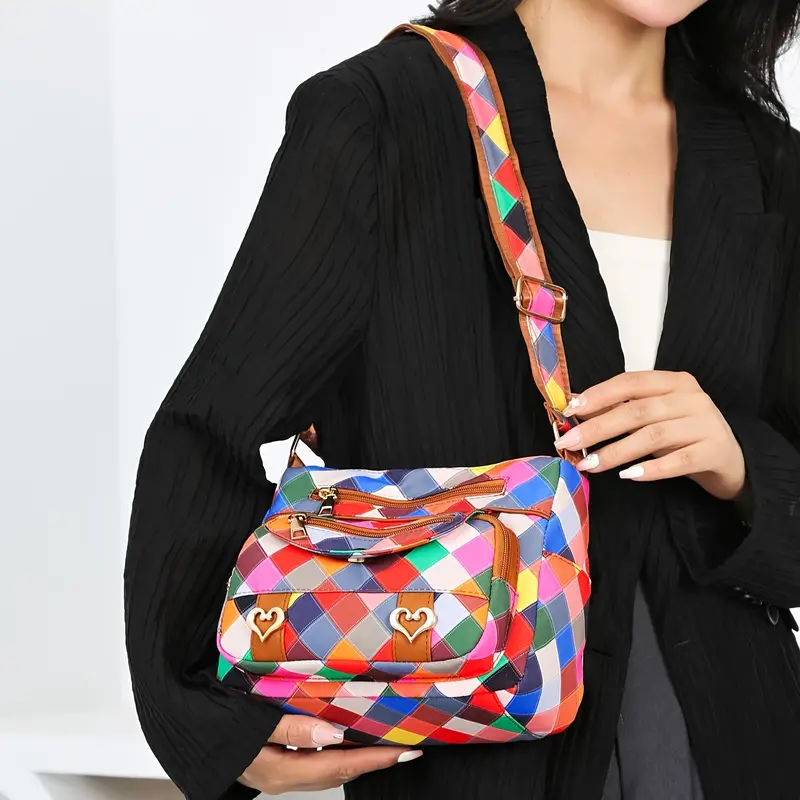 colorful geometric hip hop style womens crossbody bag large capacity with multiple pockets durable nylon vibrant red with brown accents zip closure details 5