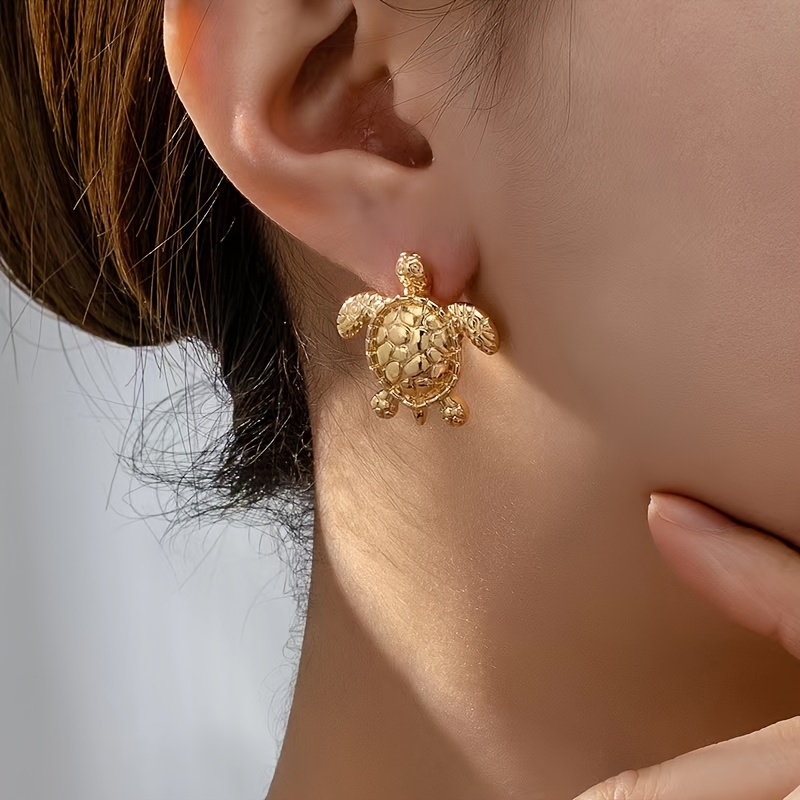 

A Pair Of Simple And Elegant Earrings That Are Accessories.