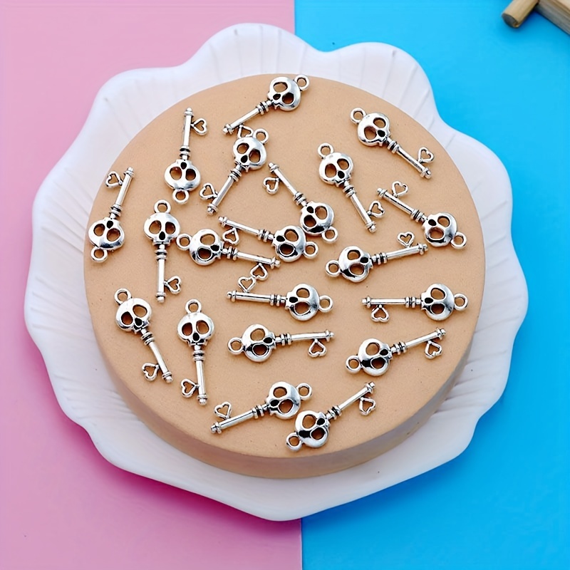 Image of 20pcs Of Vintage Silvery-colored Key Pendants, Ideal For Small Business Supplies. Made Of Alloy, Key Charms Are Perfect For Jewelry Projects, Including Necklaces And Earrings