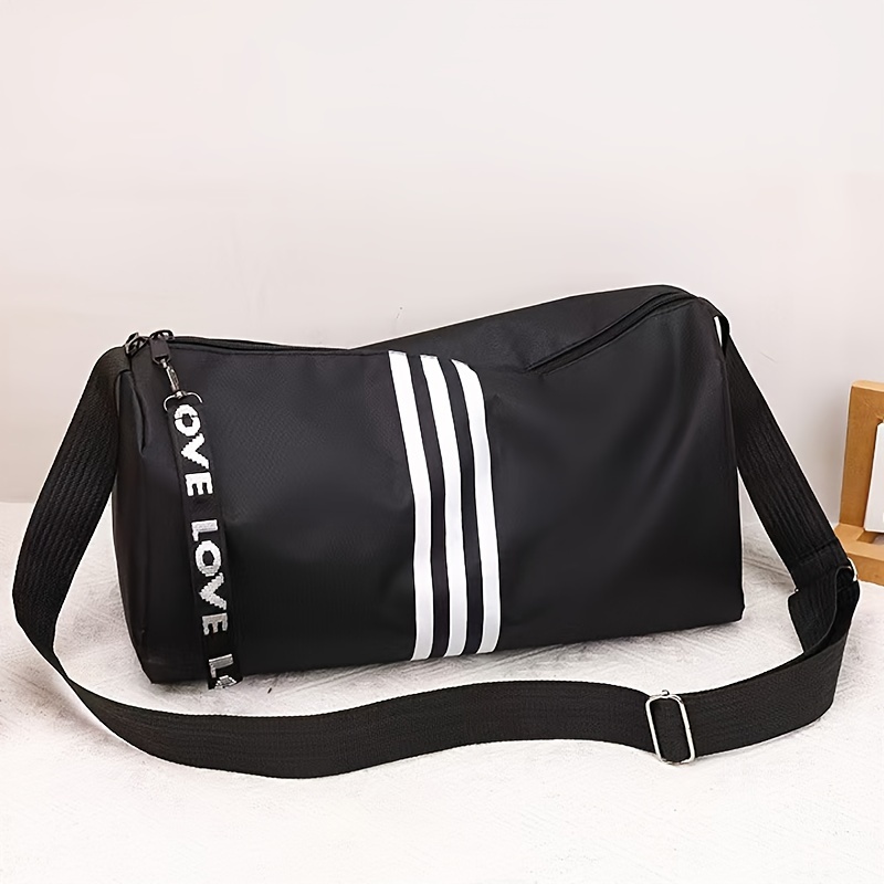 

Sac de sport résistant à l'eau avec tissu Oxford, noir, lavage à la main ou nettoyage à sec, parfait pour les courts voyages et le shopping.