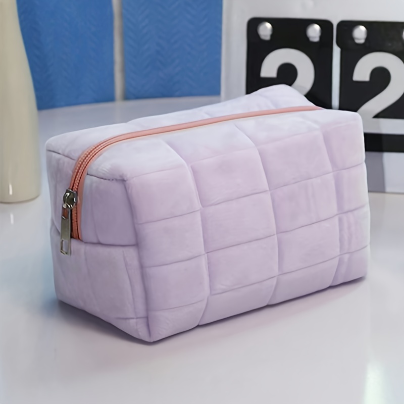 a cosmetic storage bag designed with a chic and minimalist   for students and women for travel storage makeup bags vacation organizers and large capacity cosmetic cases   suitable for lipsticks brushes skincare products phones   and small items making it versatile for home use gifts and vacations featuring a bohemian style Product details 8