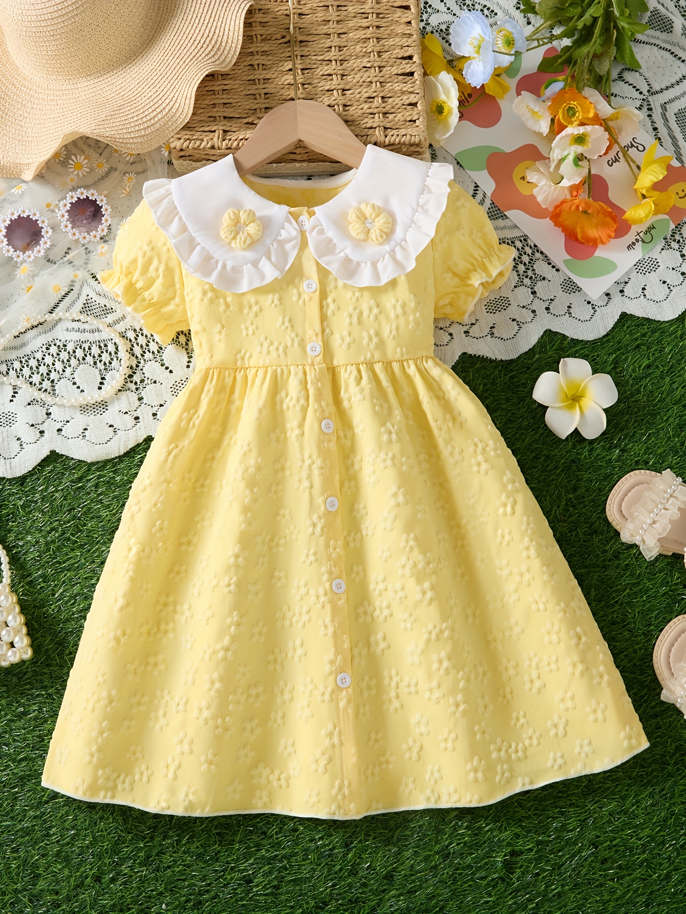 Girls' summer and spring dress with turned-up collar, scalloped hem, short  sleeves with * cuffs on * embossed flowers all over, front * A-line dress  in * style * under 12