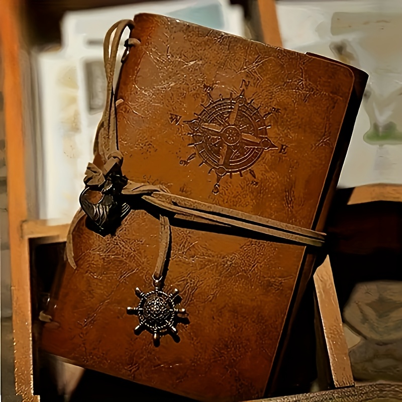 A Vintage Leather Notebook with a Matte Finish - Features an Antique Pirate-Themed Maritime Compass Design, Hardbound Writing Journal with a Metal Clasp And Spiral Binding.