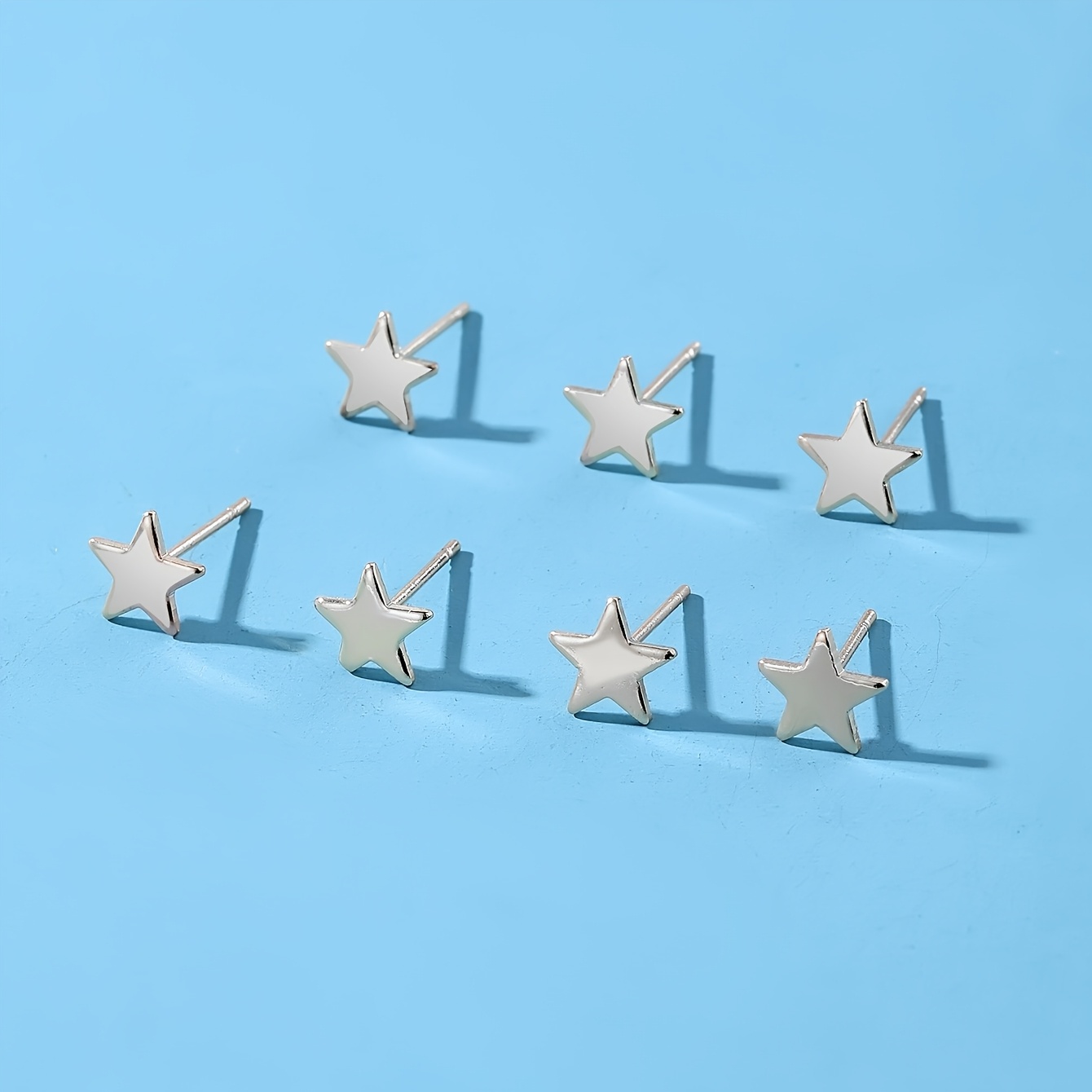 TEMU Juego de 7 pendientes de tachuelas de estrella en varios estilos , con un diseño elegante, minimalista, versátil y de moda. pendientes son