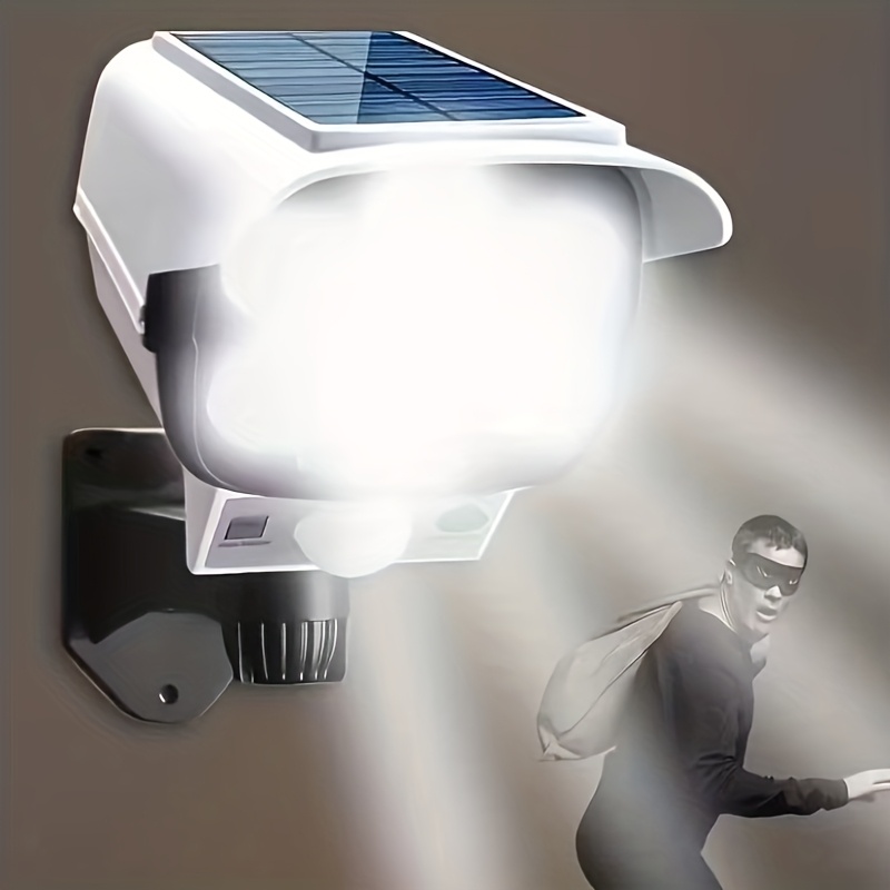Luz con sensor de movimiento de 1 pieza, alimentada por energía solar, con brillo ajustable, 77 focos LED | Activación por sensor de cuerpo humano | Iluminación de seguridad para exterior, porche y jardín con cámara falsa, fácil instalación, luz de advertencia comercial