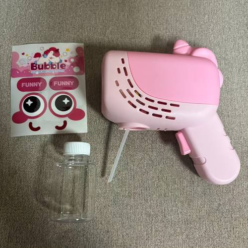 a push and blow bubble cartoon toy with 10 holes designed for children with lights and of producing of bubbles summer outdoor play suitable for boys and girls ages 3 and up