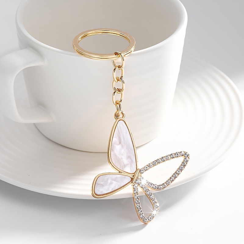 Image of 1pc Fashionable And Gorgeous -shaped Keychain Pendant Accessory, Decorated With Transparent Rhinestones, Suitable For Women's Keychain Bag Packaging Decoration