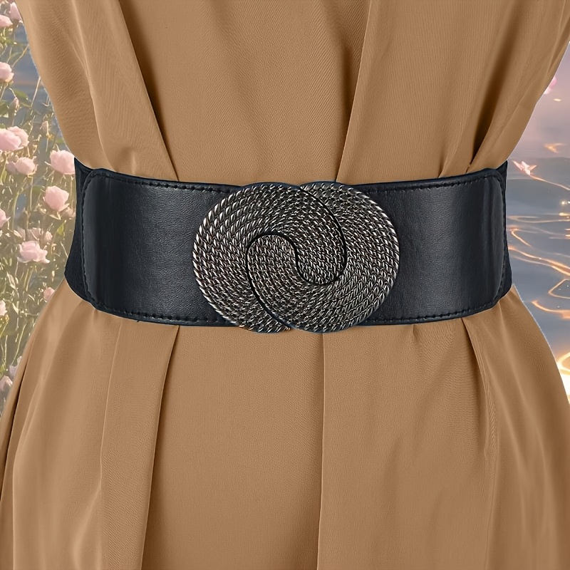 

Une Ceinture Élastique Polyvalente Pour Femmes Adaptée À Diverses Robes, Avec Un Design Nouveau Et Une Ceinture Noire Ajustée.