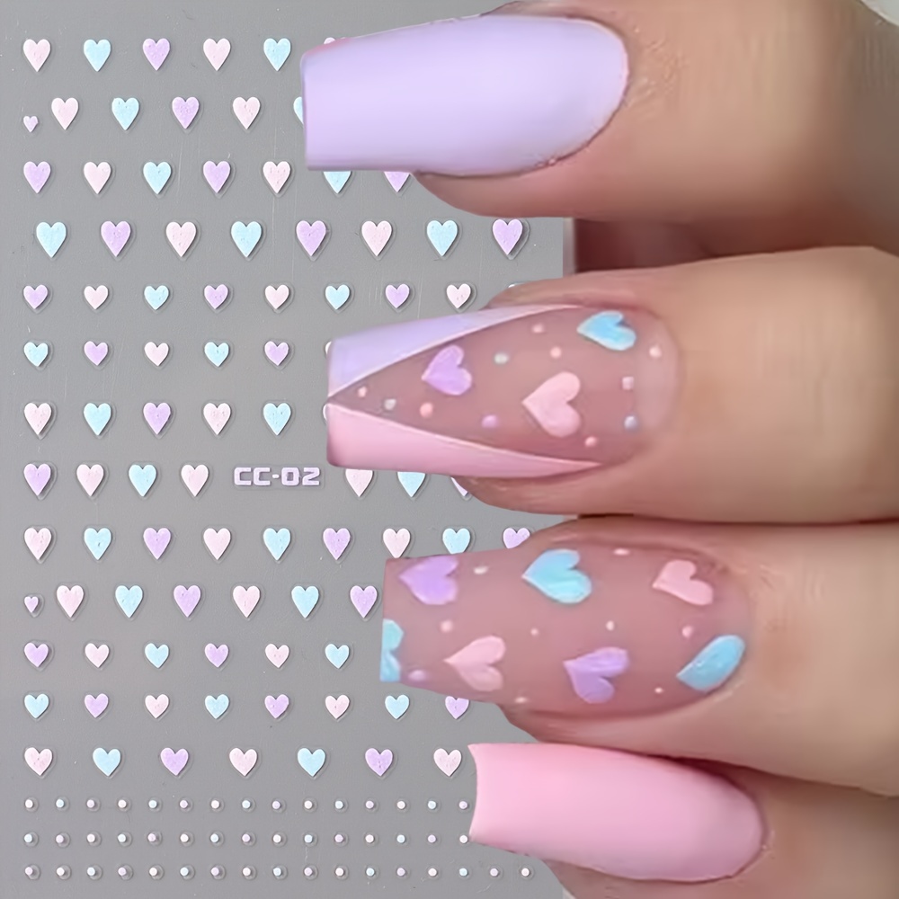 

Lot de 6 autocollants à ongles polyvalents : floraux, cœurs et étoiles dans des couleurs pastel avec pailletée