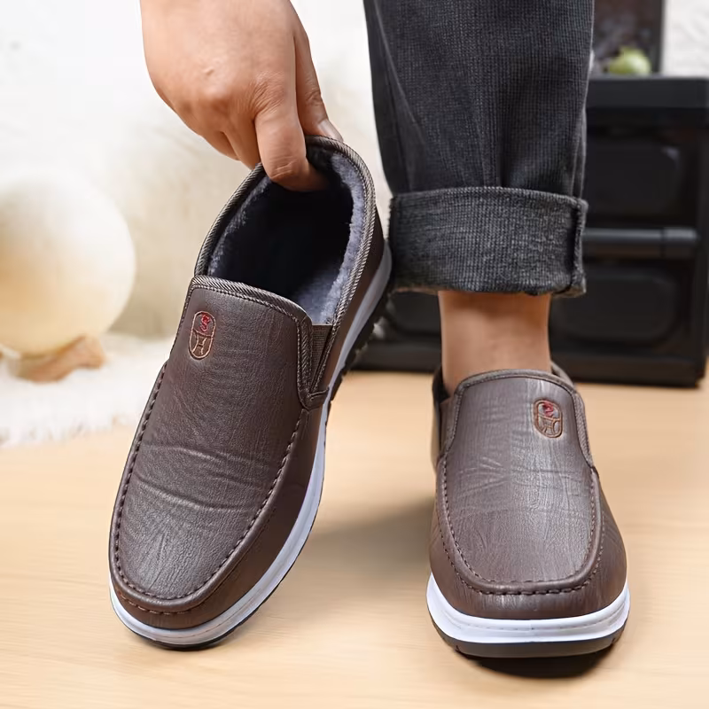 mens winter boots slip on ankle boots with a flat design black insulated footwear featuring thickened warm lining low heeled round toe non slip solid color minimalist style outdoor pvc sole hiking shoes Product details 8