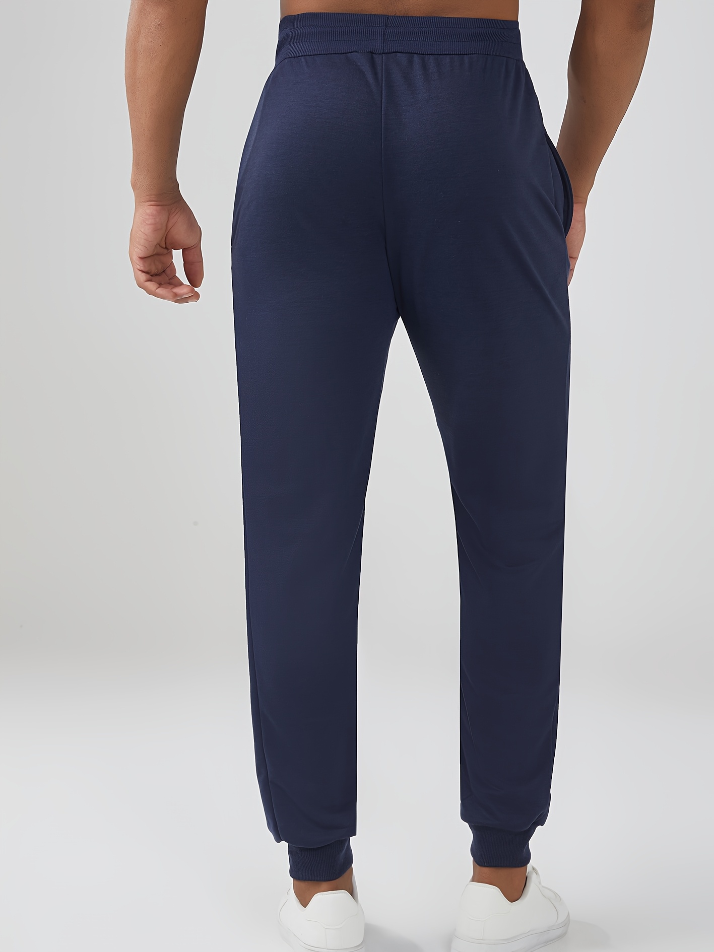 Four-piece set of new Men's casual sports pants, perfect for spring and summer. Made with 100% polyester quick-dry fabric that prevents Light Beige irritation after intense sweating and is durable. Features a slight stretch technology for unrestricted movement during jumping and turning, allowing full freedom in any activity. Ideal for gym workouts, outdoor hiking, daily commuting, rock climbing, city cycling, and fitness training